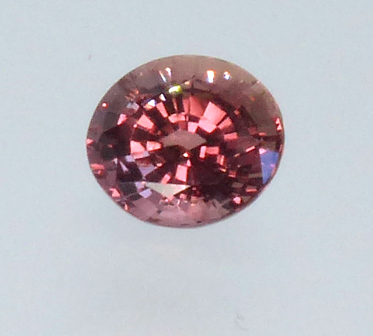 rosey orange sapphire