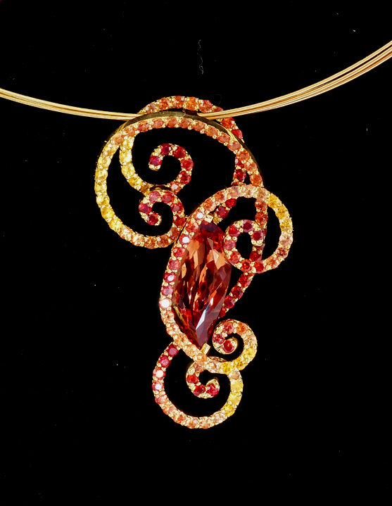 custom imperial topaz pendant with sapphires