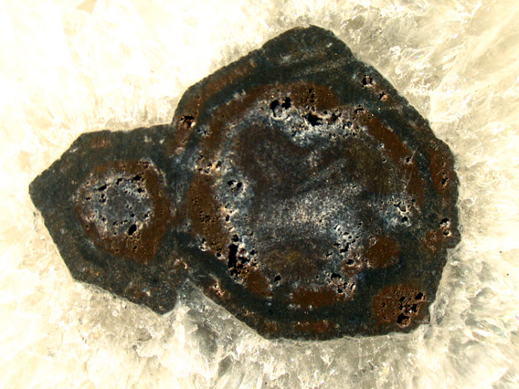 quartz geode slice with tourmaline crystals