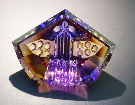 fancy carved faceted ametrine with optical dishes